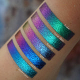 Right angled arm swatches on medium skin tone of Oculus Jewelled Multichrome Eyeshadow shifts compared to Crown Glass, Rosette, Spire, Lunette