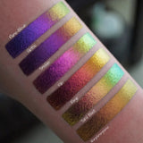 Left angled arm swatches on fair skin tone of Smoulder Jewelled Multichrome Eyeshadow shifts compared to Sand Blast, Forge, Kiln, Gothic, Flame-Blown