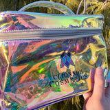 Left side view of Rainbow Cosmetic Bag being held