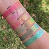 Top angled arm swatches on fair skin tone of Signet Electric Mulitchrome Pigment shifts compared to Cinder, Oriel, Mural, Niello and Motif