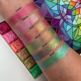 Top angled arm swatches on fair skin of Niello Electric Multichrome Pigment shifts compared to Cinder, Signet, Oriel, Mural and Motif