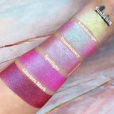 Top angled arm swatches on fair skin tone of Bottom left arm swatches on fair skin tone of Glaziers Mark Glitter Multichrome Eyeshadow shifts compared to Sunbeam, Kaleidoscope, Translucency, Spotlight