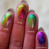 Stright angled finger swatches on fair skin tone of Gargoyle Jewelled Multichrome Eyeshadow next to Weld, Forge, Flame-Blown