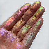 Close up hand swatch on fair skin tone of various Series 2 Iridescent Multichromes