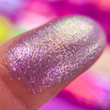 Macro finger swatch of Infusion on fair skin tone