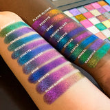Left angled arm swatches on fair and deep skin tones of Gargoyle Jewelled Multichrome Eyeshadow shifts compared to Anneal, Castle, Oculus, Lunette, Crown Glass, Spire, Rosette, Flame-Blown