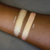 Arm swatches on deep skin tone of Linny and Centaur