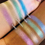 Top angled arm swatches on deep and fair skin tones of Cathedral Pastel Multichrome Eyeshadow shifts next to Tower, Keystone, Turret