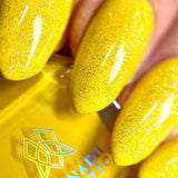 Close up of nails done with Lemonade Stand and Gel Pen nail lacquers on fair skin tone