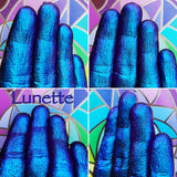 Finger swatches of Lunette Jewelled Multichrome Eyeshadow angle shifts blue-indigo-violet-pink