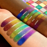 Left angled rainbow arm swatches on fair and deep skin tones of Kiln Jewelled Multichrome Eyeshadow shifts next to Gothic, Forge, Patina, Anneal, Spire