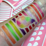 Low angled arm swatches on fair skin tone using Dragon Fruit With Bars