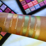 Straight angled arm swatches on medium skin tone of Royal Pear Earth Vibrant Multichrome Eyeshadow shifts compared to Cobblestone, Royal Peach, Bronze Fountain, Estate and Iron Gate