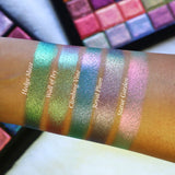 Straight angled arm swatches on medium skin tone of Climbing Vine Earth Vibrant Multichrome Eyeshadow shifts compared to Hedge Maze, Wall of Ivy, Royal Plum and Statue Garden