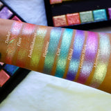 Straight on view of arm swatches on medium skin tone of Adornment Glitter Multichrome Pigment shifts compared to Trinket, Flare, Embellishment, Flagstone, Ciel, Etched and Glaziers Mark