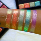 Straight angled arm swatches on medium skin tone of Court Jester Glitter Vibrant Multichrome Eyeshadow shifts compared to Empress, Duchess, Diadem and Noble