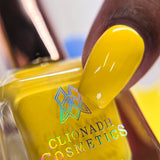 Close up of one nail done with Lemonade Stand nail lacquer on deep skin tone