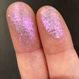 Close up finger swatches of Tracery Glitter Multichrome Eyeshadow