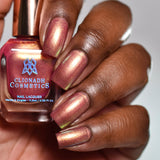 Close up front angled nails done with Dragontini Fruitlacquer on deep skin tone.