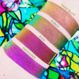 Top angled arm swatches on fair skin tone of Forge Jewelled Multichrome Eyeshadow shifts compared to Sand Blast, Kiln, Smoulder