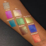 Top angled arm swatches on medium skin tone of Nocturnal Duochrome Eyeshadow next to Amulet, Hex, Clairvoyance, Morgana, Eye of Newt, Toadstool, Fog, Salamander