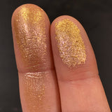 Close up finger swatches on fair skin tone of Blaze Glitter Multichrome Eyeshadow