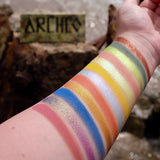 Low angled shot of arm swatches of the Archeo Palette on fair skin tone.