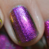 Close up shot of Smoulder Lite nail lacquer on a single finger nail