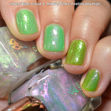 Close up shot of nails done with Cloud 9 and Feeling Sky High Nail Lacquers over a green base on fair skin tone.