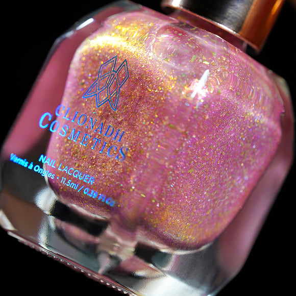 Cosmopolitan Nail Lacquer - an angled close up shot with a black background