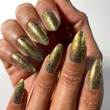 Top angled shot of nails done with Kiss Nail Lacquer on medium skin tone.