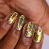 Upside down shot of nails done with Kiss Nail Lacquer on deep skin tone.