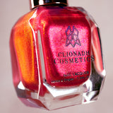 Close-up, angled shot of La Vie En Rose Nail Lacquer bottle on a beige background.