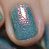 Close up shot of one nail done with Love Letter Nail Lacquer on fair skin tone.