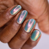 Upside down shot of nails done with Love Letter Nail Lacquer on deep skin tone.