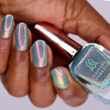 Upside down shot of nails done with Love Letter Nail Lacquer on deep skin tone.