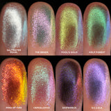 Collage of macro finger swatches on fair skin of the 8 shades included in the Deep Sea Treasures Palette.