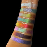 Arm swatches on medium skin tone of all 8 shadows included in the Deep Sea Treasures Palette. Top to bottom: Saltwater Pearl, The Bends, Fool's Gold, Kelp Forest, Ring of Fire, Cephalopod, Shipwreck and S.C.U.B.A.