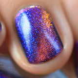 Macro shot of one nail done with Norpsilocin Nail Lacquer on fair skin tone.