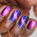 Close up shot of nails done with Norpsilocin Nail Lacquer on deep skin tone.