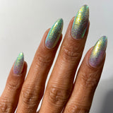 Top angled shot of nails done with Ophelia Nail Lacquer on medium skin tone.