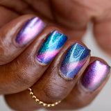 Close up shot of nails done with Psilocin Nail Lacquer on deep skin tone.