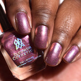 Close up shot of nails done with Quench Fruitlacquer on deep skin tone.