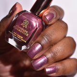 Close up shot of nails done with Quench Fruitlacquer on deep skin tone.