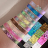 Arm swatches of Vineyard as well as the other 9 Holiday Countdown Box shadows on fair skin tone.