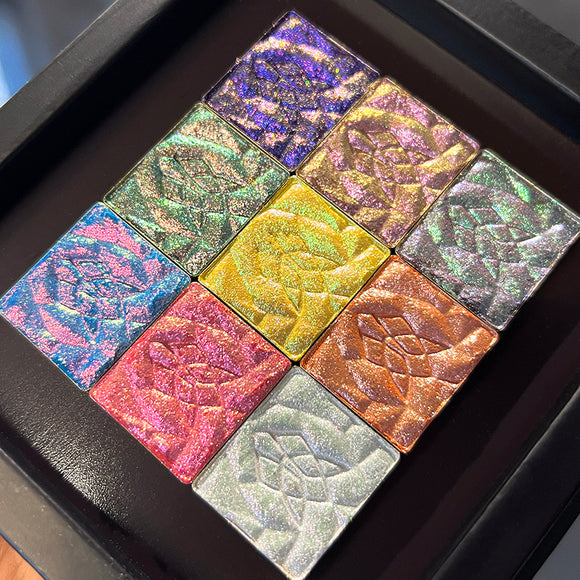 Close up shot of the Halloween Stained Glass Expansion shadows in an open Mini Palette.