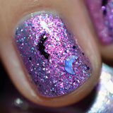 Close up shot of one nail done with Spellcast Nail Lacquer on fair skin tone.