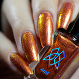 Close up shot of nails done with Ring of Fire on fair skin tone.