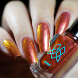 Close up shot of nails done with Ring of Fire on fair skin tone.