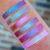 Top angled arm swatches on fair skin tone of Engrave Glitter Multichrome Eyeshadow shifts compared to Abrasion, Grisaille, Glaziers Mark, Kaleidoscope